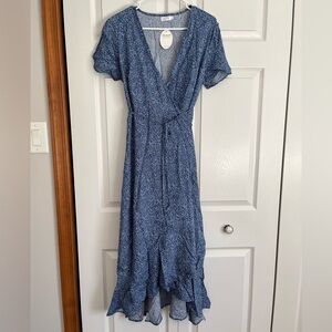 Blue and white wrap dress. Ruffled, high/low hem.